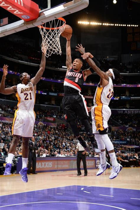 Damian Lillard posterizes Lakers' Jordan Hill & Ed Davis | The Source