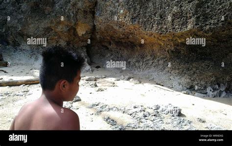 Boy Standing At Beach Stock Photo - Alamy