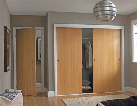 Sliding doors in built-in wardrobe (Premdor "SpeedRobe") | Tall cabinet storage, Built in ...