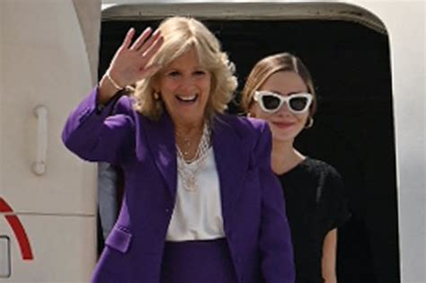 Jill Biden Slips on Her Go-To Valentino Pumps With Purple Skirt Suit ...