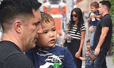 Trent Reznor shows his soft side as he dotes on his sons during family day out | Daily Mail Online