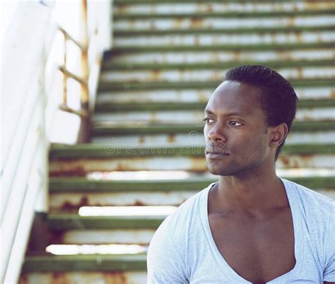 Portrait of a Handsome Black Man Looking Away Stock Image - Image of attractive, alone: 32766301