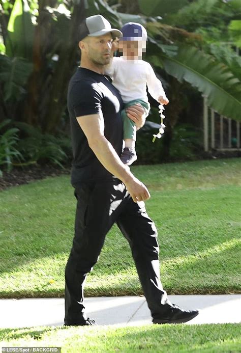 Jason Statham cuts a casual figure as he enjoys quality time with his son Jack in Los Angeles ...