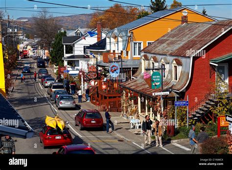 Canada, Quebec Province, Charlevoix, Baie-Saint-Paul, shops along rue Saint-Jean-Baptiste Stock ...