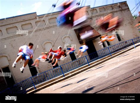 Kids on carnival ride Stock Photo - Alamy