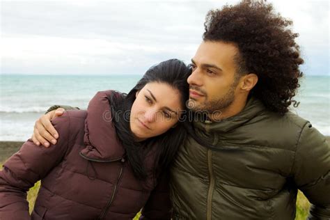 Sad Couple Hugging in Front of Ocean in Winter Feeling Bad Closeup ...