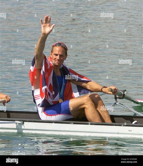 Steve Redgrave salutes the British support after winning his fifth consecutive gold medal ...