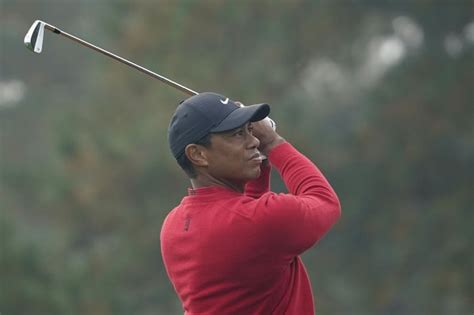 Tiger Woods smiling, standing in first Instagram photo following car ...