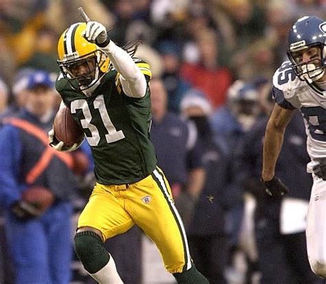 Jan. 4, 2004: Al Harris' INT in OT has Packers moving on | Nfl playoffs ...