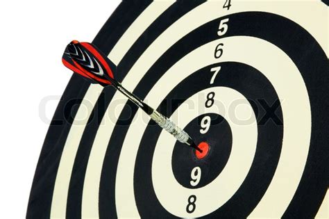 An arrow game with a dart has hit the ... | Stock image | Colourbox