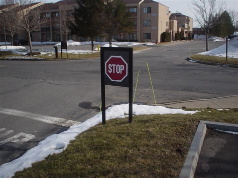 Stop Sign | More signage in the parking lot. | JJ Richards | Flickr