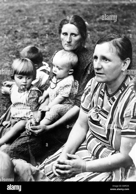 The Nazi propaganda picture shows Volksdeutsche refugees from Poland after arriving in a German ...