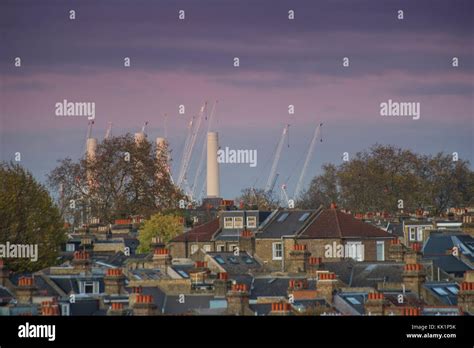 Battersea Power Station chimneys in the distance in a London scene ...