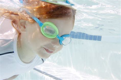 Child Swimming in Pool Underwater Stock Photo - Image of swimming, swimwear: 53839990