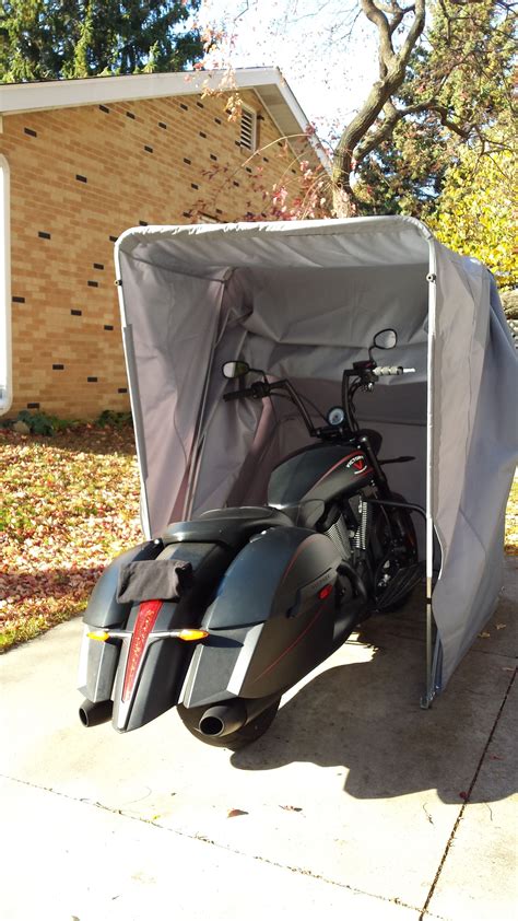 The Bike Shield is an easy and self-enclosing motorcycle storage / shelter / garage / cover unit ...