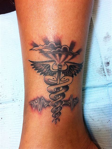 Pin by Rob Presley on Tattoo art | Medical tattoo, Symbol tattoos, Fire ...