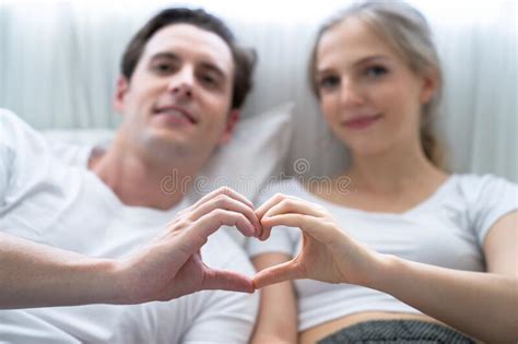 Couple Making Heart Shape with Hands, Happy Smiling Couple in Love ...