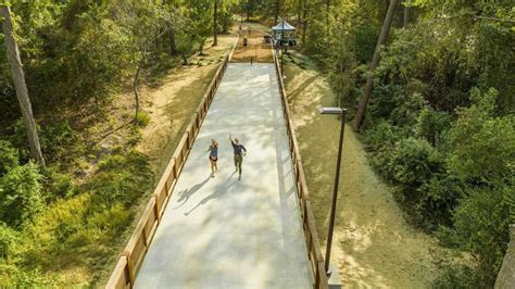 Memorial Park's highly anticipated addition to famed running trail opens with bridges, stunning ...