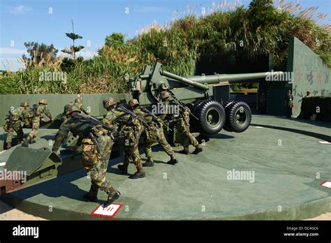 The Taiwan Military soldiers performing positional and firing drills ...