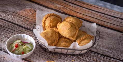 Curry puff pastry, snack curry puff, locally known as karipap Stock Photo | Adobe Stock