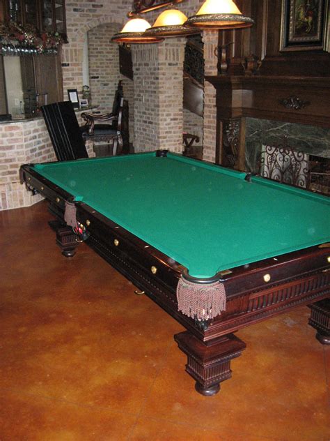 Converting a full size pool table into a Dining table with a custom built table top.