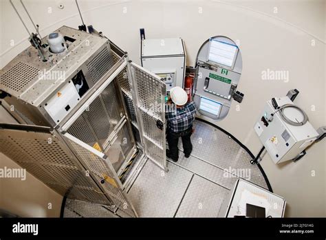 Engineer working in wind turbine Stock Photo - Alamy