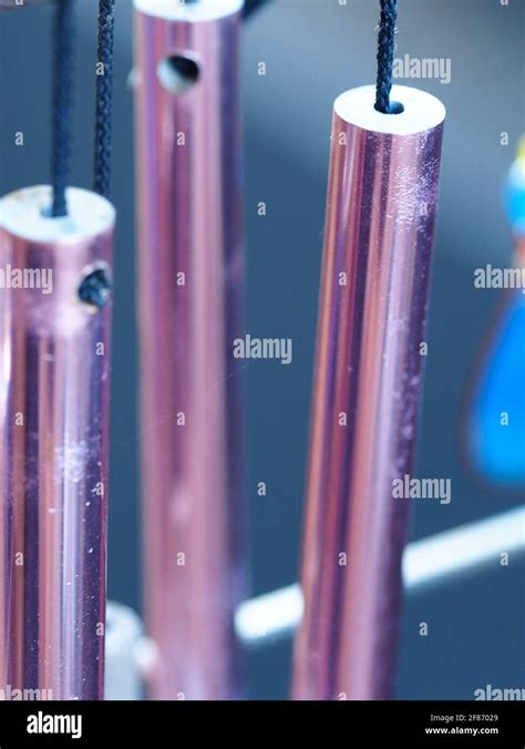 Copper wind chimes Stock Photo - Alamy