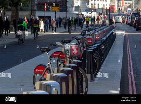 A Santander Cycles docking station. Santander Cycles (Boris Bikes) is a public bike hire scheme ...