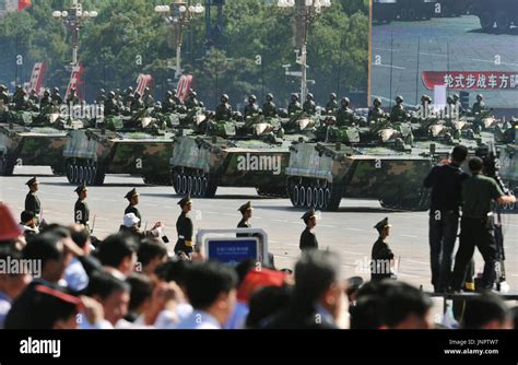 BEIJING, China - Some 500 tanks are driven in a military parade at ...