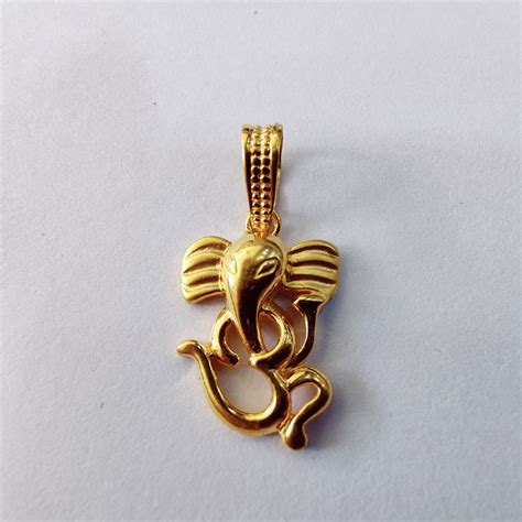 Buy quality 22k gold om with ganpati bappa exclusive pendant in Ahmedabad