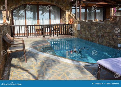 Hotel Veranda and Swimming Pool Stock Image - Image of greece, leisure: 74550329