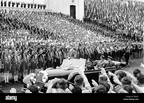 Nuremberg Rally 1938 in Nuremberg, Germany - Adolf Hitler drives past ...