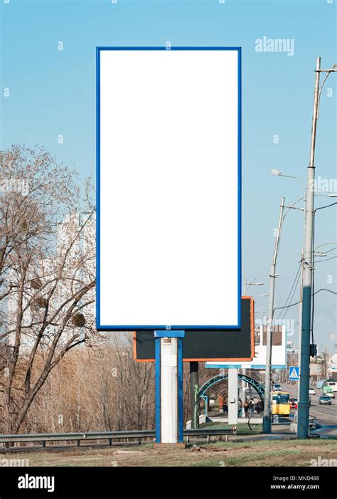 Blank vertical billboard near a highway. Background for mock-up Stock Photo - Alamy