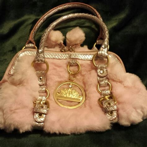 62% off Paris Hilton Handbags - Pink fuzzy Paris Hilton Purse from Maria's closet on Poshmark