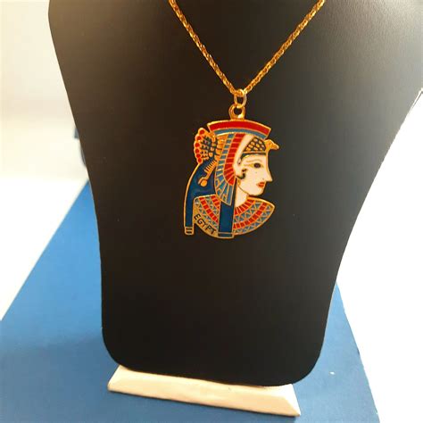 "This beautiful Hand Made brass necklace Features Cleopatra Pendant Made In Egypt . Type ...