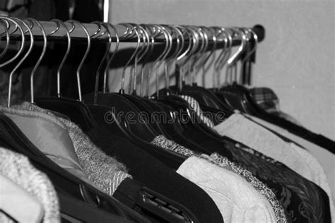 Clothes on a Hanger. Black and White Photo Stock Image - Image of fashion, clothing: 134671957