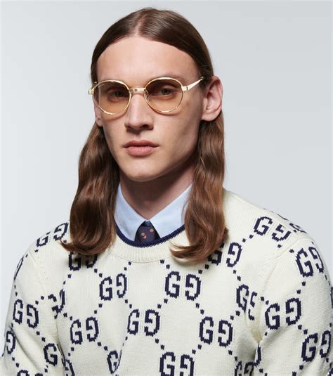 Round glasses in gold - Gucci | Mytheresa