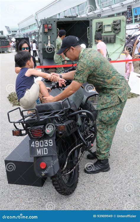 Visitors Exploring the Yamaha Tw200 Motorcycle at Army Open House 2017 in Singapore. Editorial ...