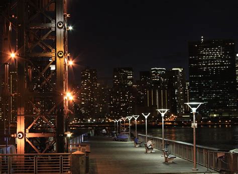 Free Images : people, boardwalk, skyline, bench, night, building, city, skyscraper, river ...