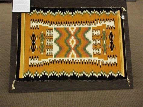 History and Culture by Bicycle: RISING FROM TRADITION NAVAJO RUGS 1900-1977