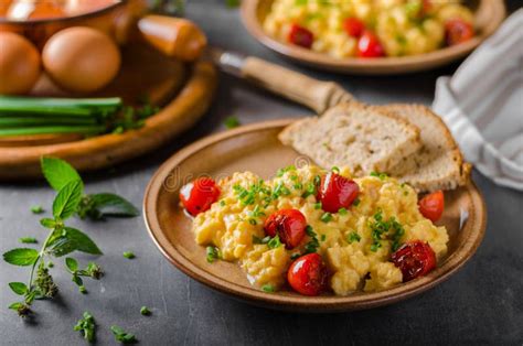 Scrambled eggs with herbs stock image. Image of background - 108180369