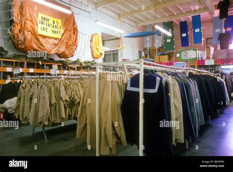 Interior of Army-Navy store with surplus military items on sale Stock Photo - Alamy