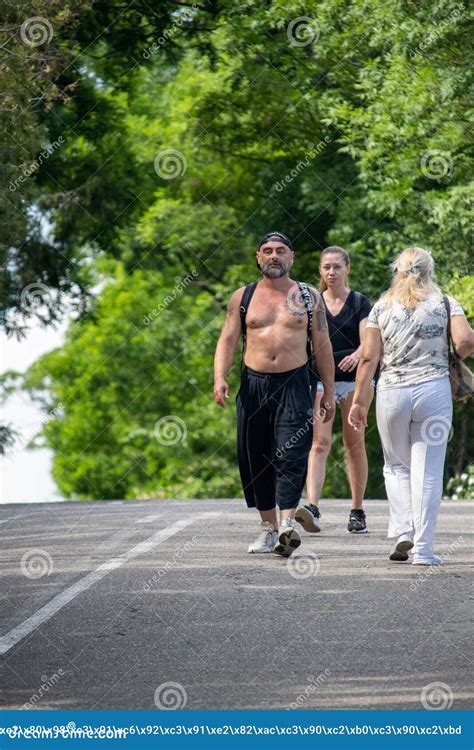 A Grizzled Man with a Maori Tattoo on His Chest and Shoulder Editorial ...