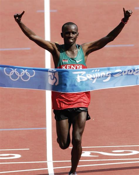 runningcoachsg: Tribute To Wanjiru - The greatest male marathon runner of the world