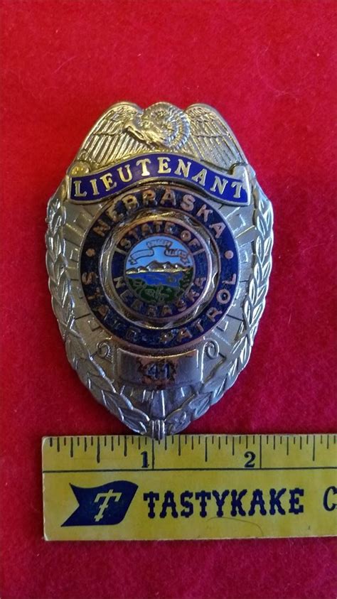 Collectors-Badges Auctions - Nebraska state police