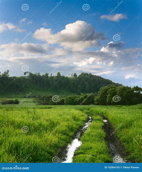 Landscape and cloudy sky stock image. Image of farm, field - 10384155