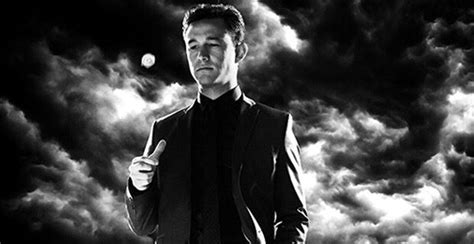 a man in a suit is standing under the dark clouds with his hand on his hip