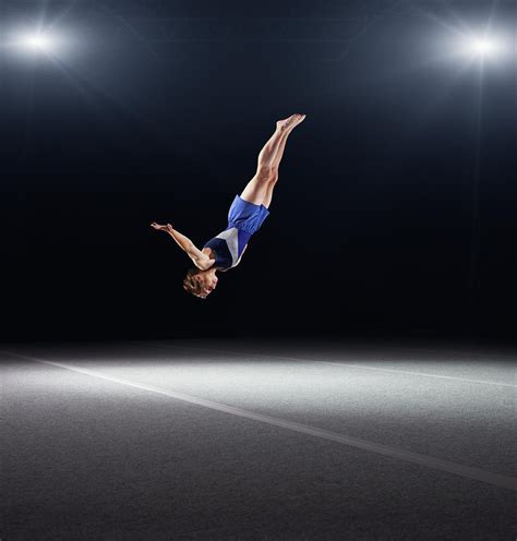 Young Male Gymnast Performing Floor Photograph by Robert Decelis Ltd - Fine Art America