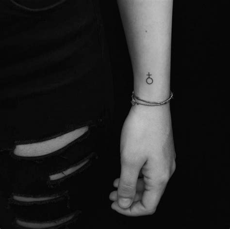 Venus planet symbol tattoo on the wrist. | Feminist tattoo, Tattoos for ...