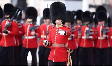 Why Royal Guards wear bearskin strap under lips instead of their chin | Royal | News | Express.co.uk